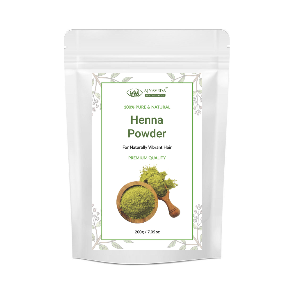 AJNAVEDA Henna Powder in eco-friendly packaging, showcasing its rich, fine powder. This 100% pure, natural powder provides vibrant color while nourishing and strengthening the hair