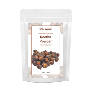 AJNAVEDA Reetha Powder in eco-friendly packaging, showcasing its finely ground, light brown powder. Known for its foaming properties, it gently cleanses the scalp and hair while promoting healthy growth and shine