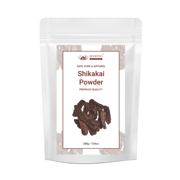 AJNAVEDA Shikakai Powder displayed in eco-friendly packaging, highlighting its fine, light brown powder. Known for its natural cleansing properties, it nourishes the scalp, strengthens hair, and promotes healthy growth.