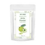 AJNAVEDA Amla Powder in eco-friendly packaging, showcasing its finely ground, light green powder. Known for its rich Vitamin C content, it nourishes hair and skin, promoting healthy growth and a radiant complexion.