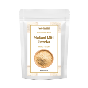 AJNAVEDA Multhani Mitti Powder (Fuller's Earth) in eco-friendly packaging, showcasing its fine, light brown powder. Known for its purifying properties, it deeply cleanses the skin, absorbs oil, and tightens pores