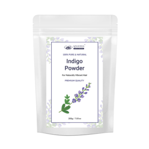 AJNAVEDA Indigo Powder in eco-friendly packaging, showcasing its fine greenish powder. This 100% natural powder provides a deep blue-black color and works effectively with henna for rich, dark hair shades